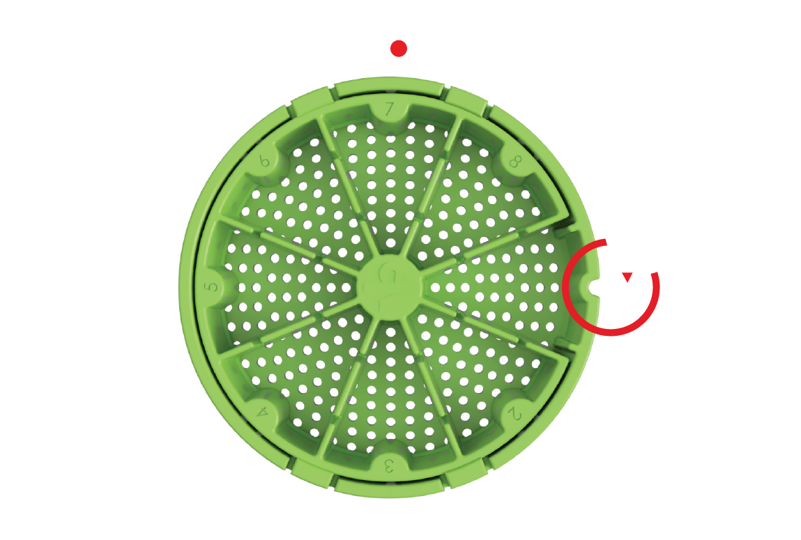 Image showing the partition and the first step to remove it: Rotate the strainer until the alignment feature is positioned at either 3 o’clock or 9 o’clock.