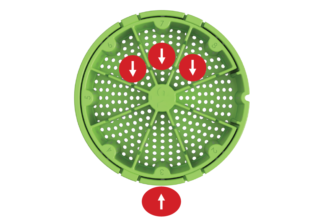 Image showing the second step for partition removal: Place three fingers inside the upper partitions and position your thumb on the outside bottom of the strainer.